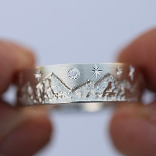 Harsheen’s Platinum Mountain Ring - Size 4.5, 2mm TH, 5mm W, Blue Centre Diamond, 4 White Star Diamonds (but 2 each side of centre blue diamond)